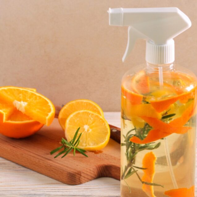 A spray bottle filled with a homemade natural cleaner