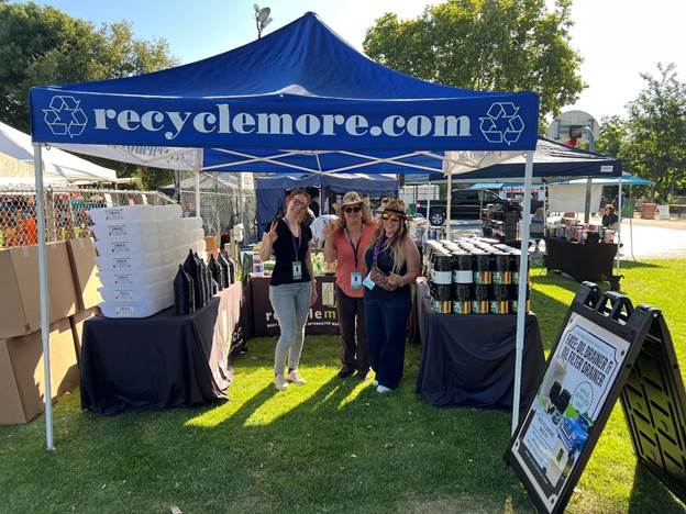 Recyclemore staff inside the booth at the Pinole Car show on June 22, 2025.